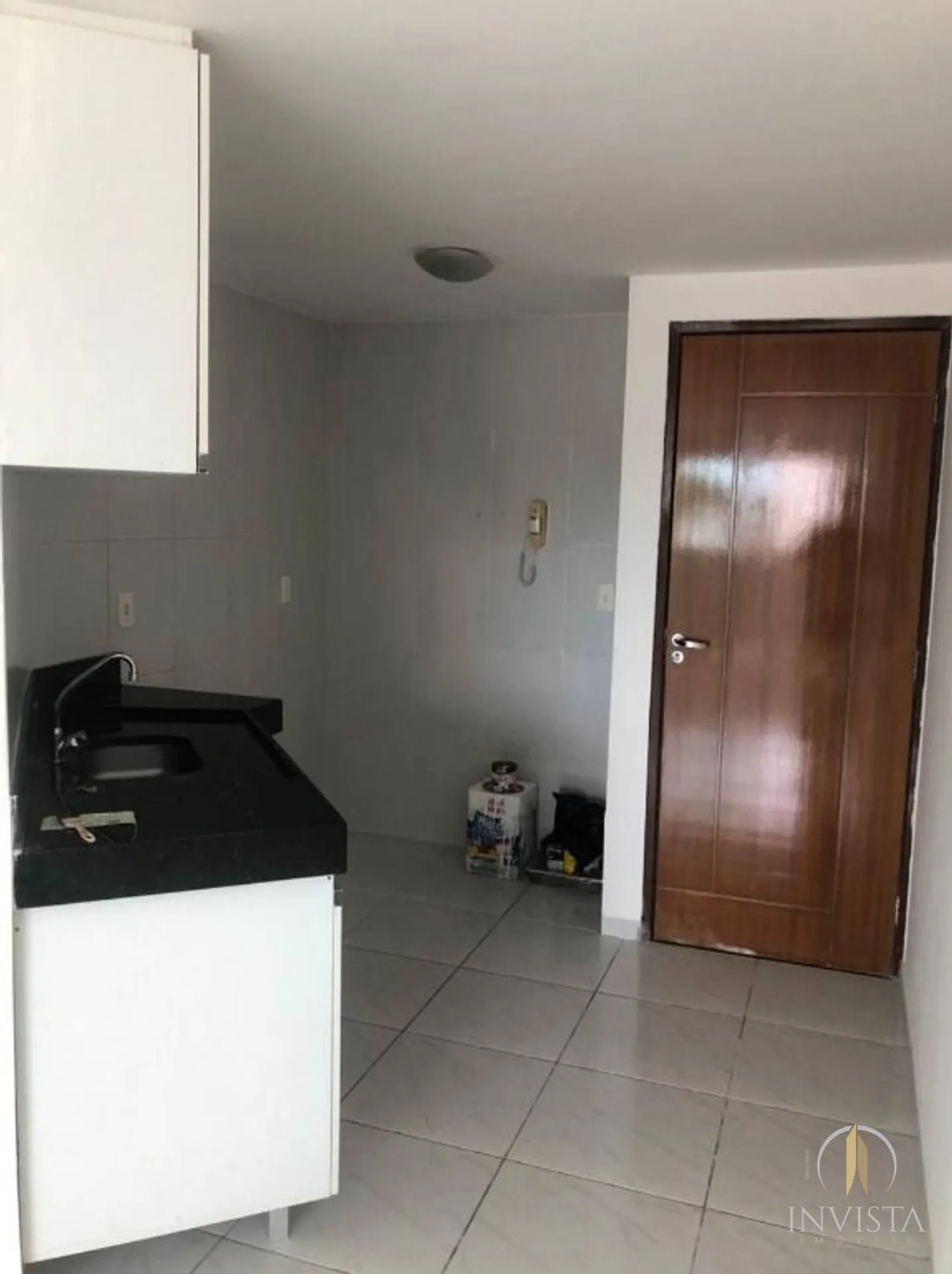2-bedroom apartment in a building with a pool