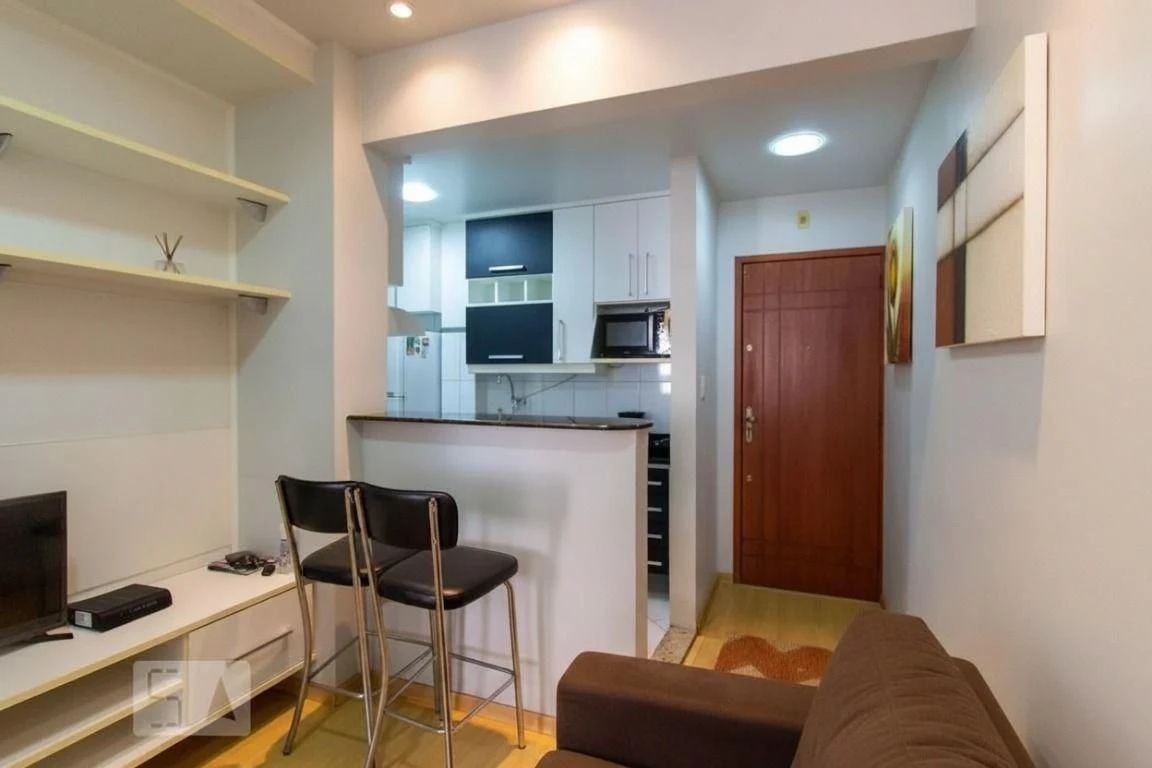 Furnished 1-bedroom apartment with a laundry area — photo 13