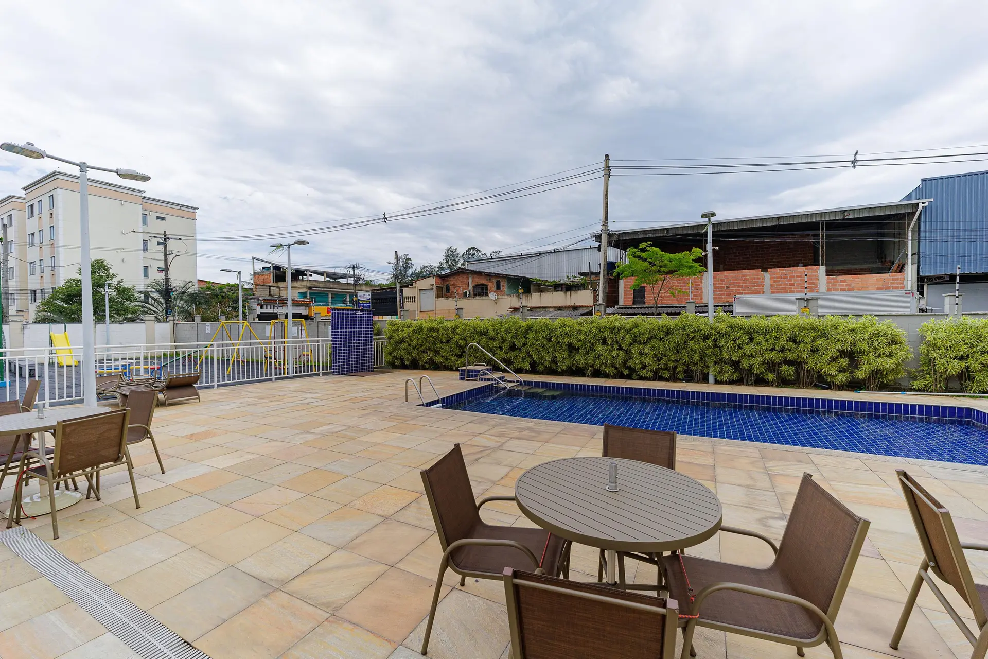 2-bedroom apartment in a building with a pool — photo 35
