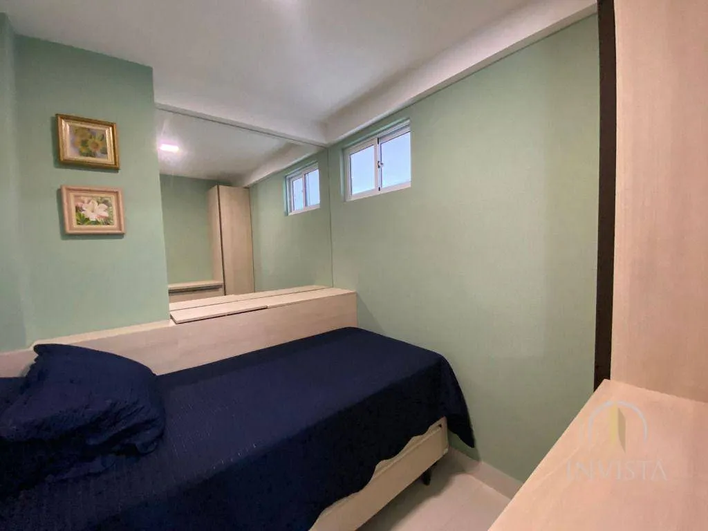 2-bedroom apartment in a building with a pool — photo 13