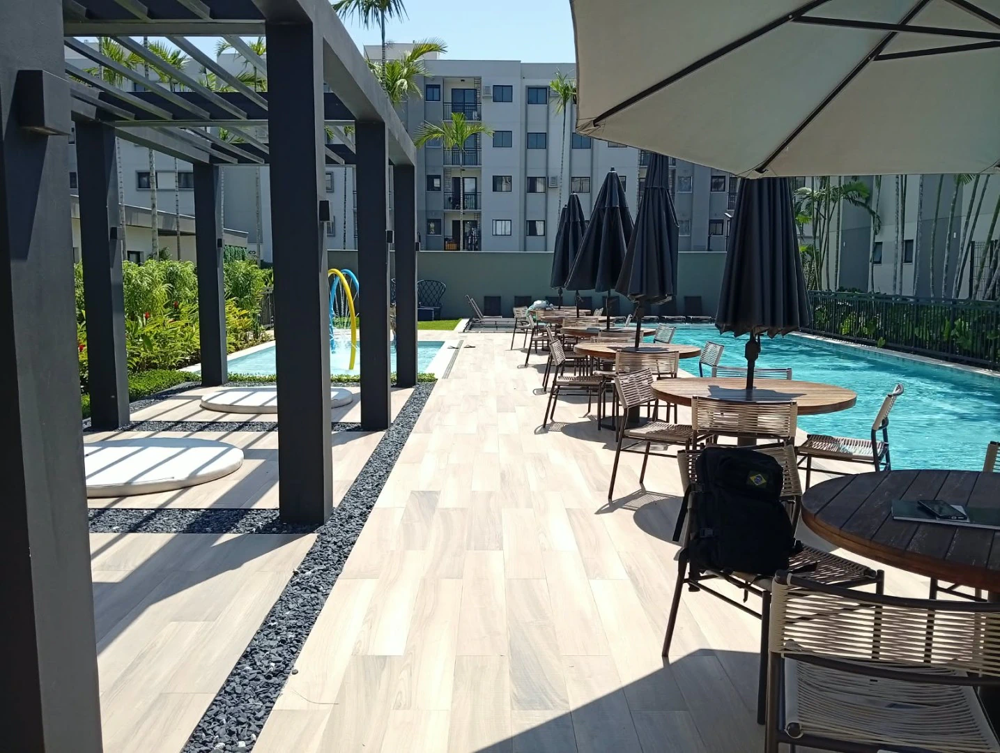 2-bedroom apartment in a building with a pool — photo 22