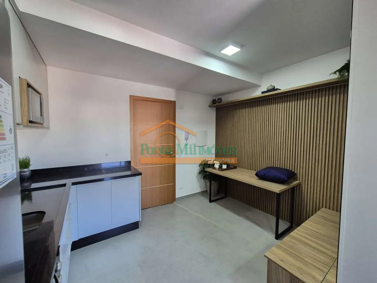 Furnished apartment with open-plan kitchen and balcony — photo 2