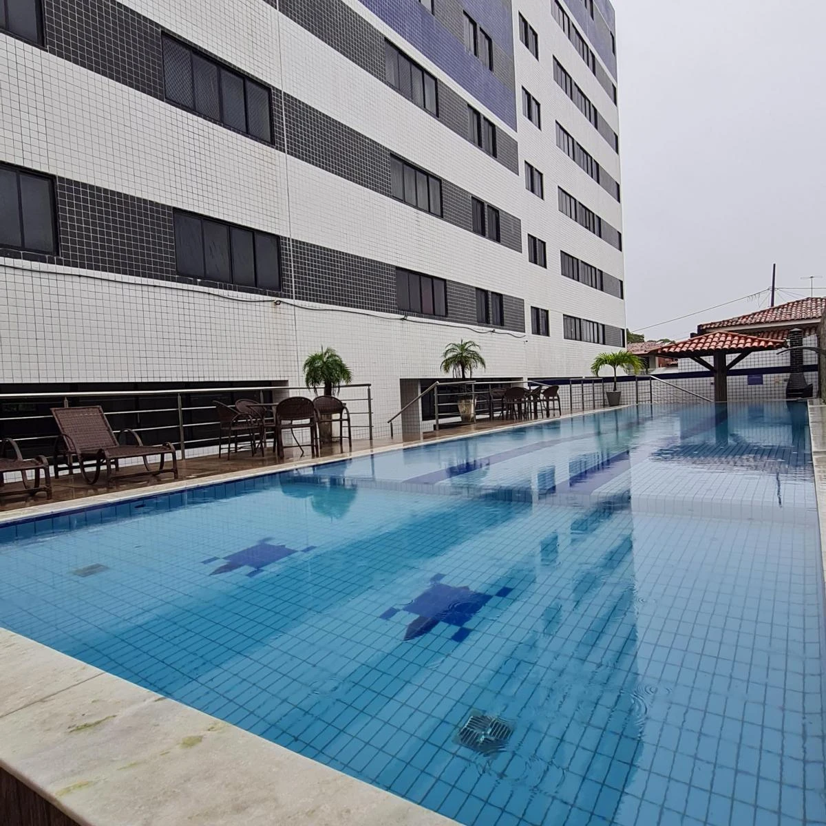 2-bedroom apartment in a building with a pool — photo 8