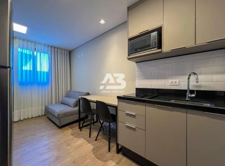 Furnished 26 m² studio with an open-plan kitchen — photo 2
