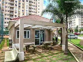 2-bedroom apartment in a building with a pool — photo 13