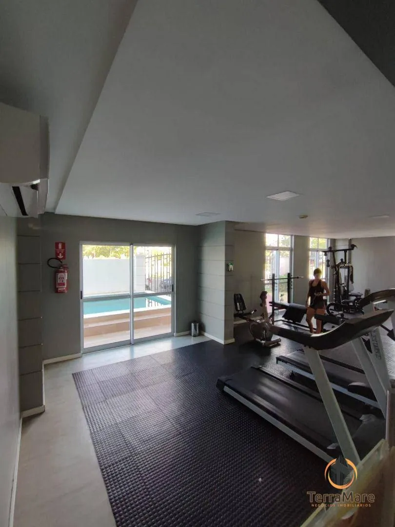 2-bedroom apartment in a building with a pool — photo 10