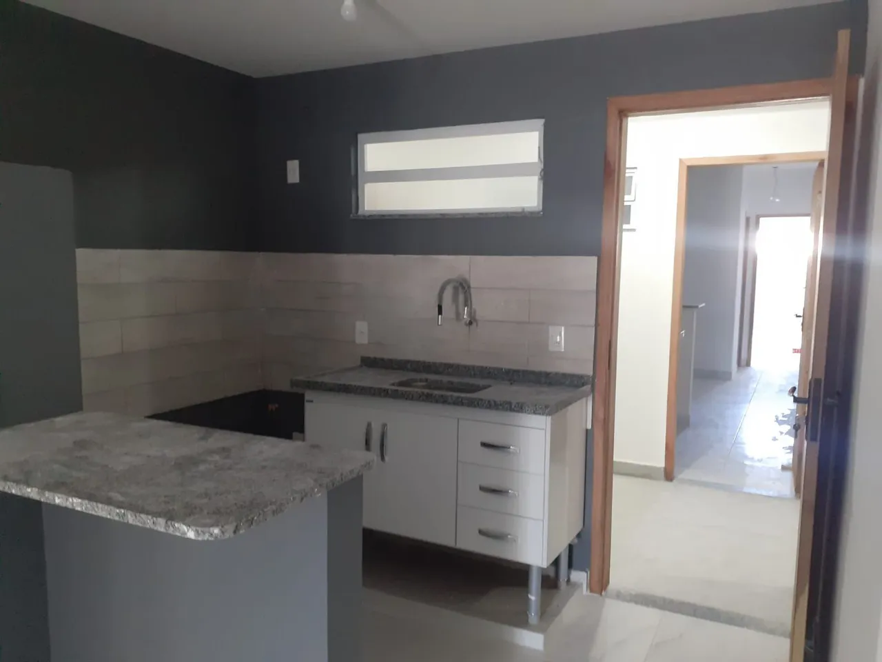 Apartamento de 1 quarto com varanda e cozinha americana