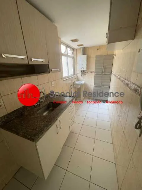3-bedroom apartment in a building with a pool — photo 2