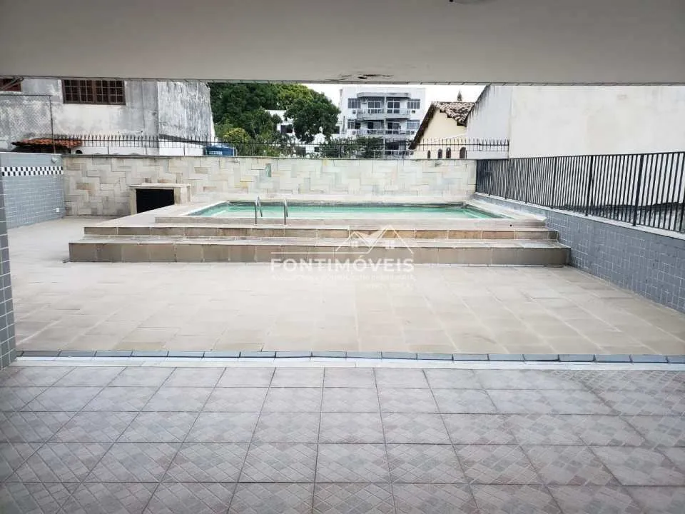 2-bedroom apartment in a building with a pool — photo 6
