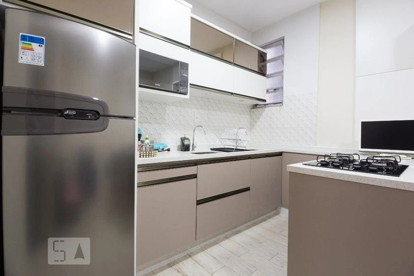 Furnished studio with open-plan kitchen and gas stove — photo 3