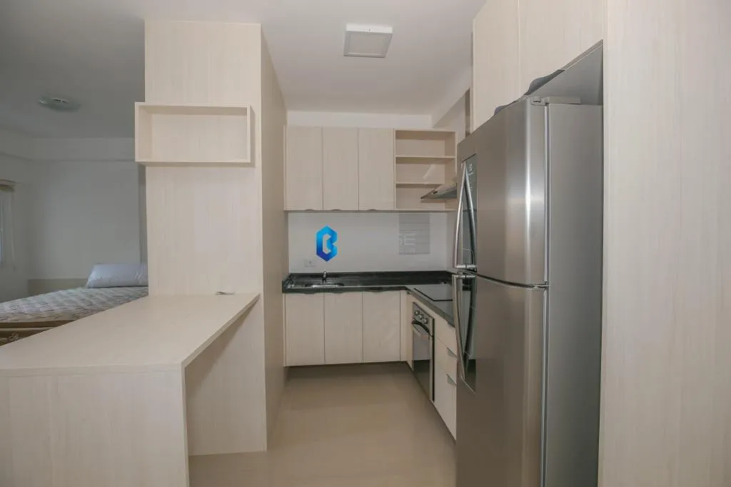 1-bedroom apartment with open kitchen and glass shower — photo 8