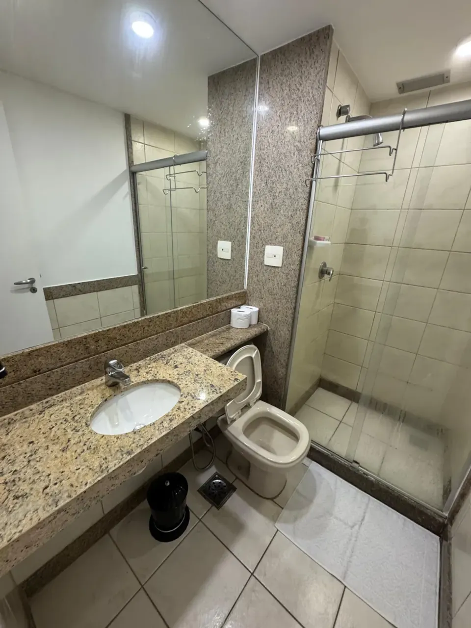 1-bedroom apartment with glass shower and electric showerhead — photo 8