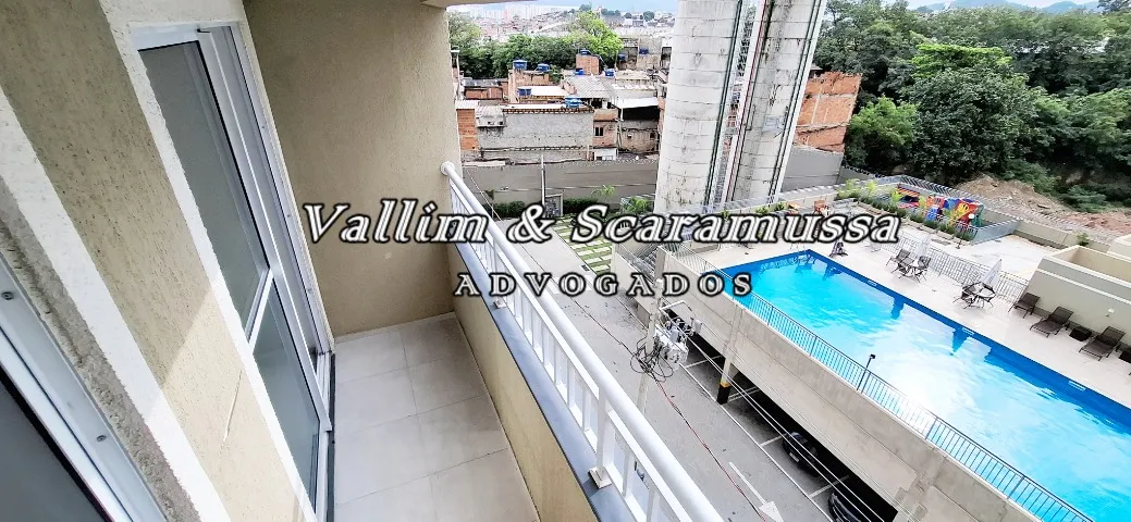2-bedroom apartment in a building with a pool — photo 9