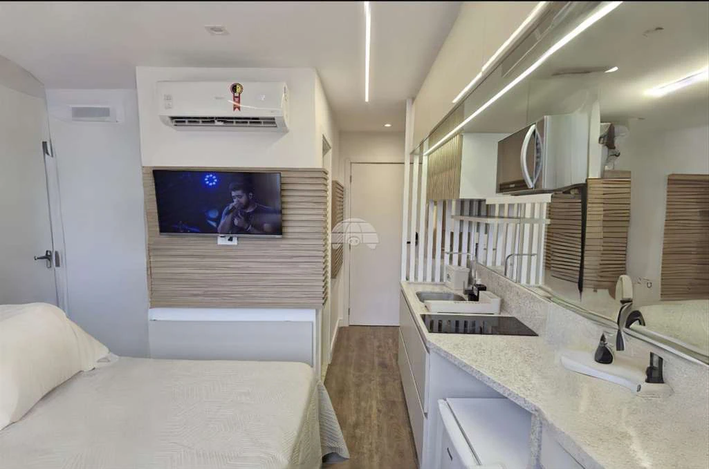 1-bedroom apartment with a laundry setup — photo 3