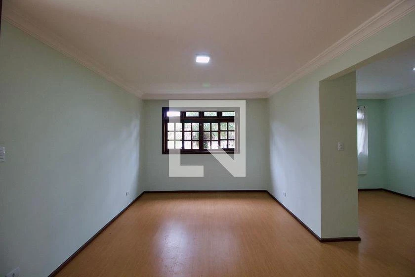 4-bedroom house with wood or laminate floors in Curitiba