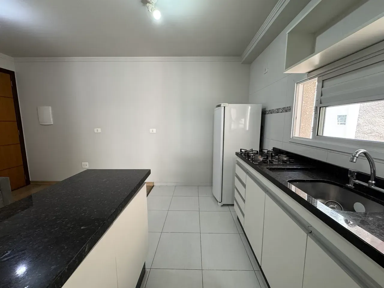1-bedroom apartment with open kitchen and gas stove — photo 11