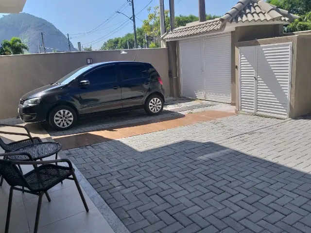 Casa com 5 quartos e 5 banheiros, cozinha com fogão a gás — photo 13