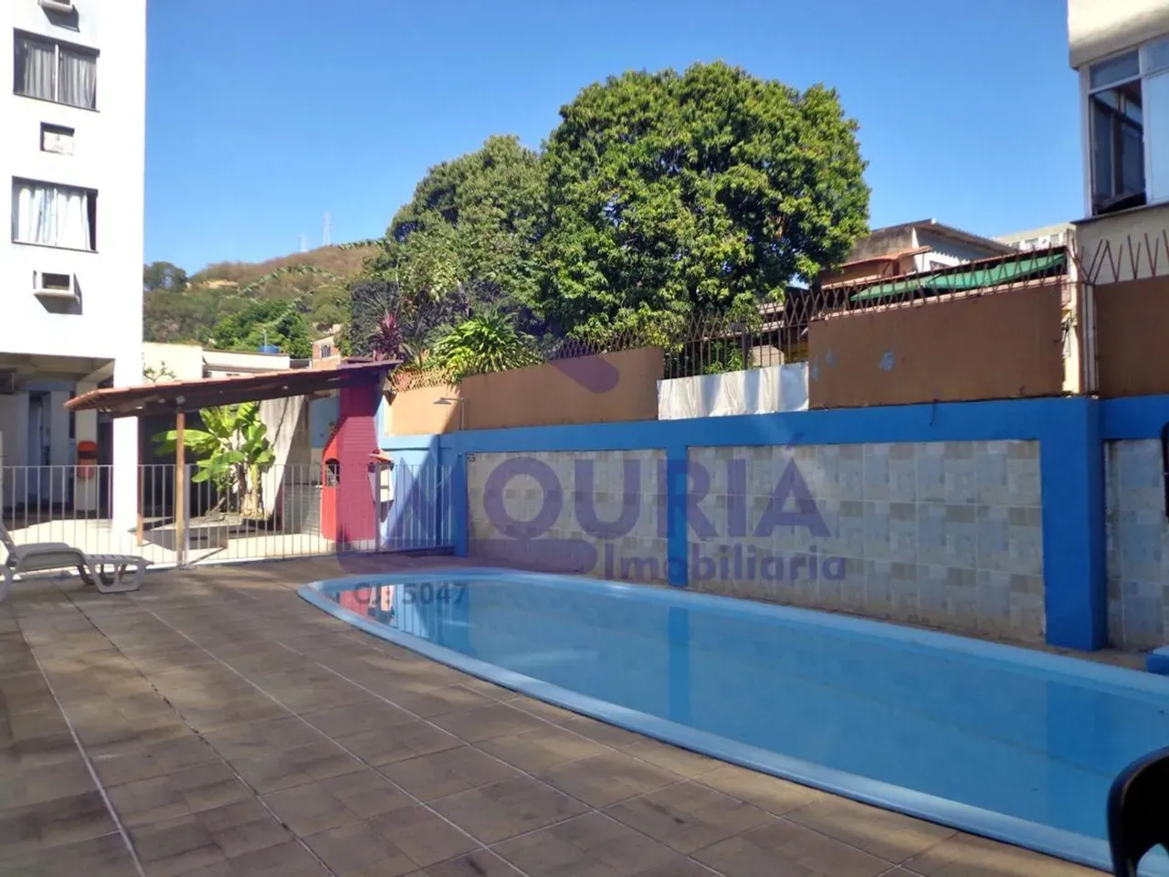 2-bedroom apartment in a building with a pool — photo 18