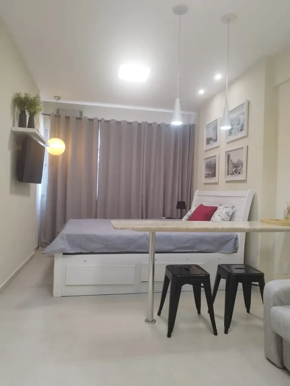 Furnished apartment with a compact cooking setup — photo 12