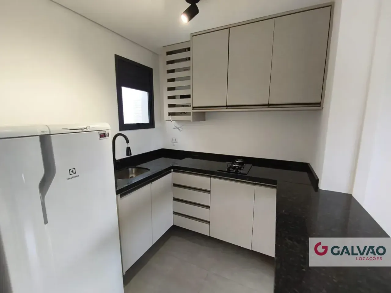 Apartamento de 28,93 m² com cozinha americana e fogão a gás — photo 4