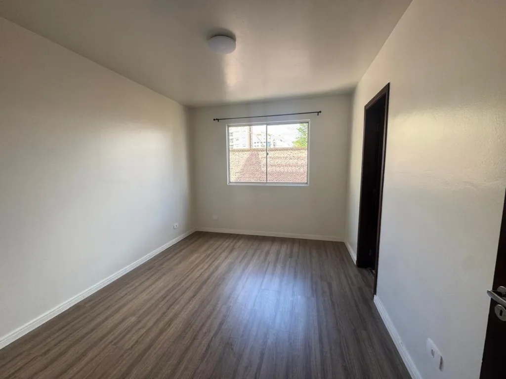 Wood or laminate floors in a 3-bedroom apartment, 64 m² — photo 10