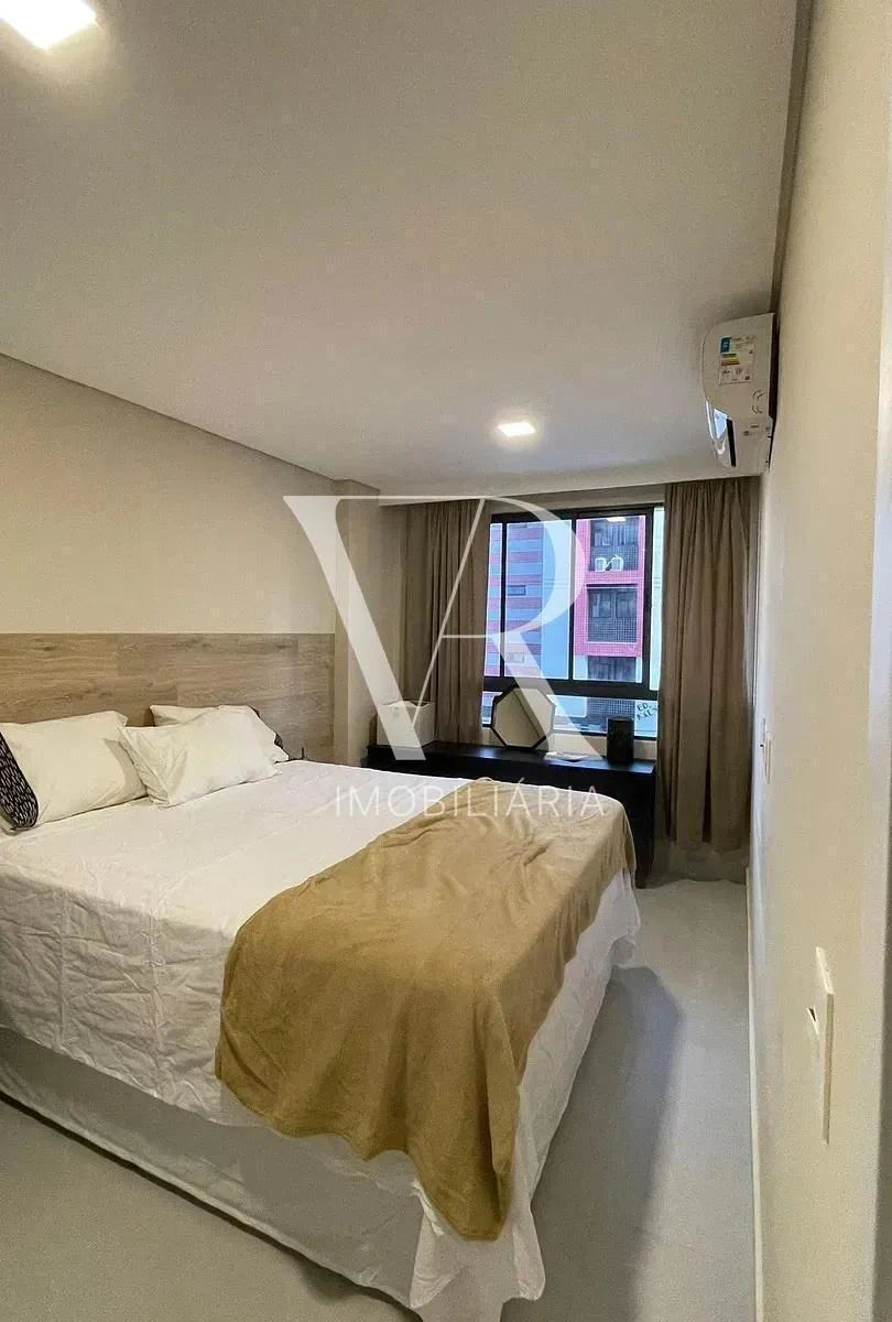 2-bedroom apartment in a building with a pool — photo 5