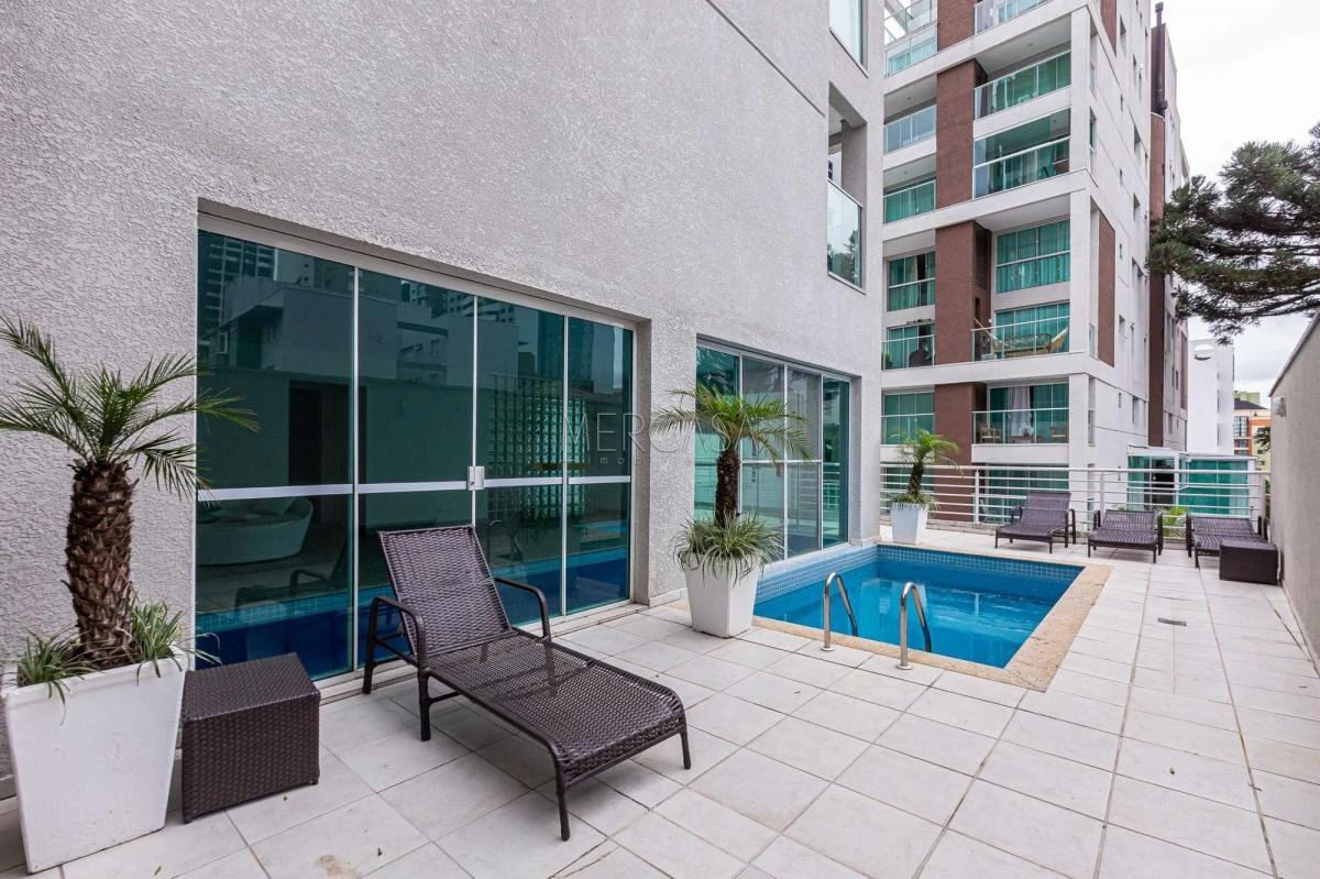 One-bedroom apartment in a building with a pool — photo 35