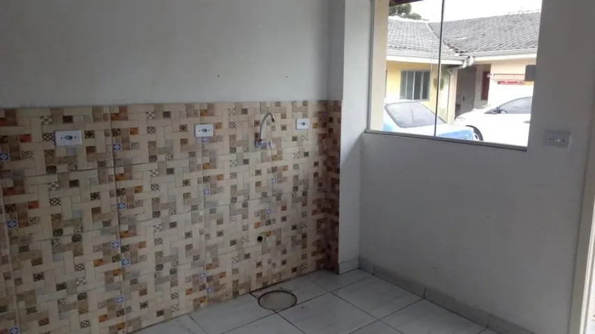 Unfurnished studio with a gas open-plan kitchen and laundry area