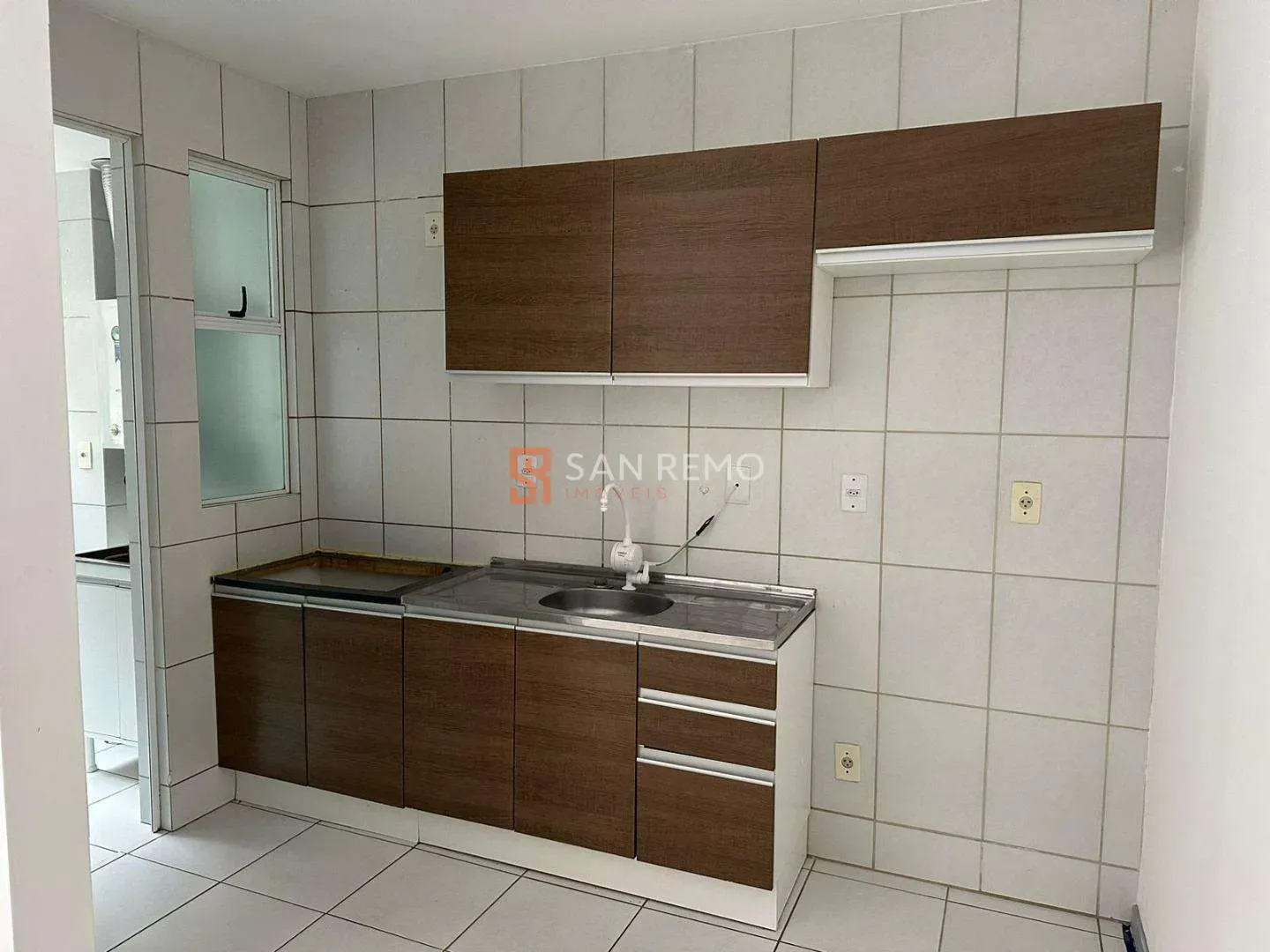 2-bedroom apartment in a building with a pool — photo 2