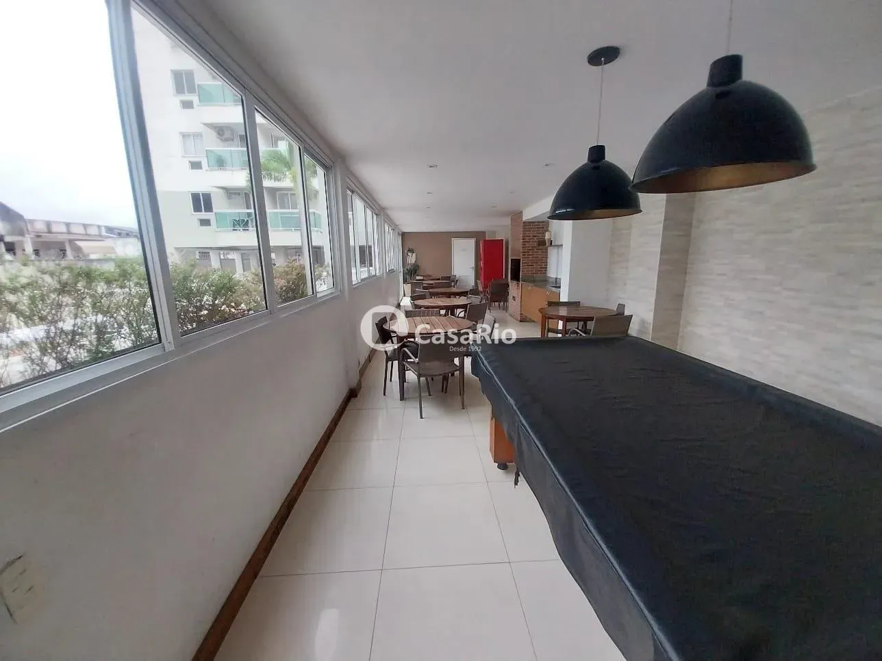 2-bedroom apartment in a building with a pool — photo 14