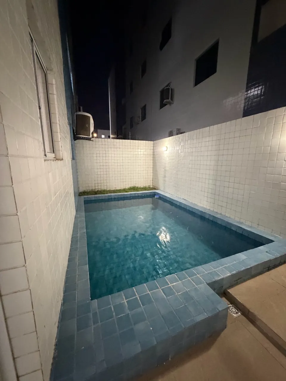 2-bedroom apartment in a building with a pool — photo 7