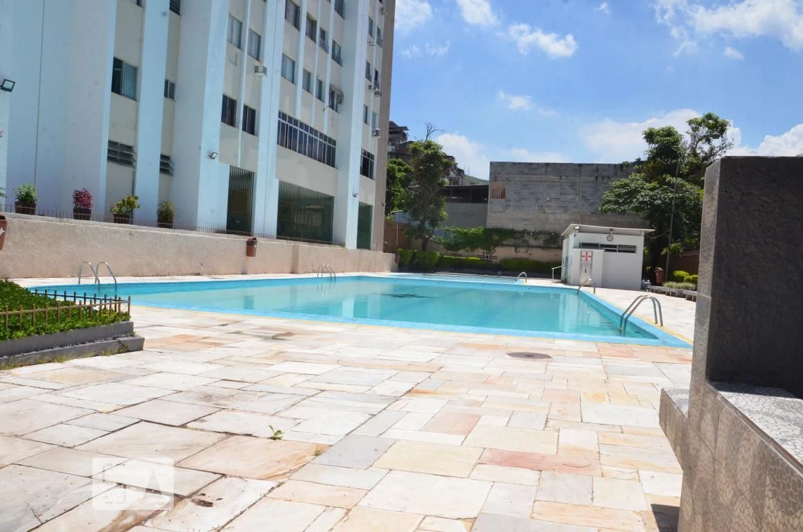 2-bedroom apartment in a building with a pool — photo 5