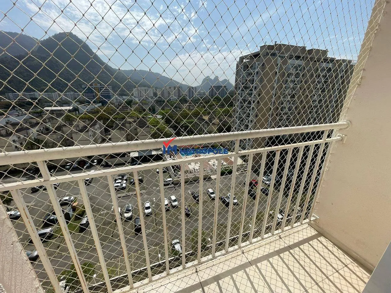 2-bedroom apartment in a building with a pool — photo 13