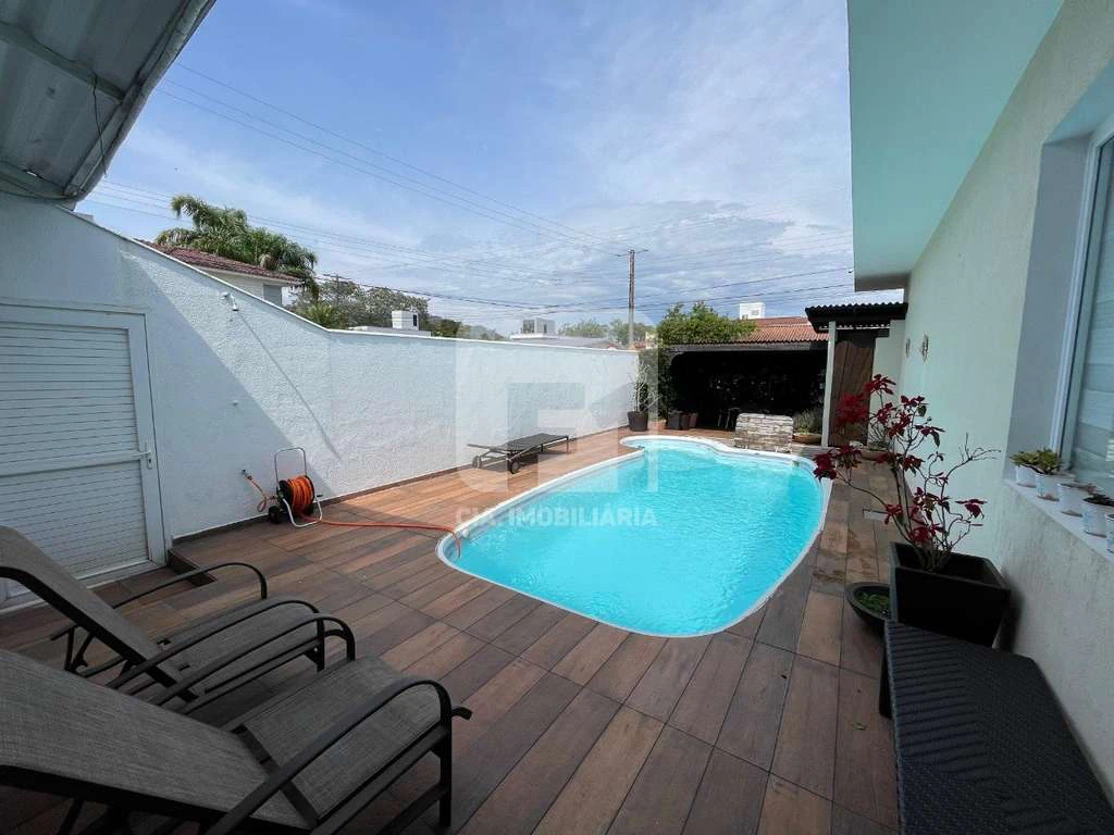 Casa com 5 quartos e 720 m², cozinha aberta e 6 vagas — photo 5