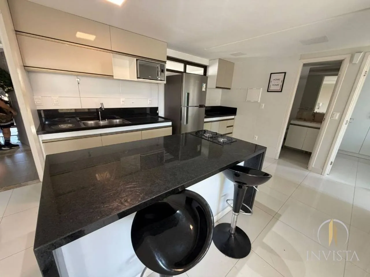 2-bedroom apartment in a building with a pool — photo 2