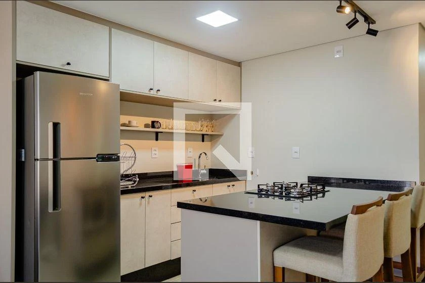 Furnished studio kitnet with kitchen-dining open plan — photo 13