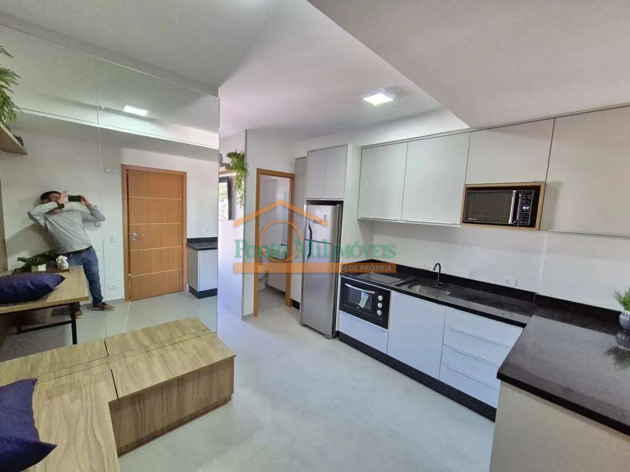 Furnished apartment with open-plan kitchen and balcony — photo 6