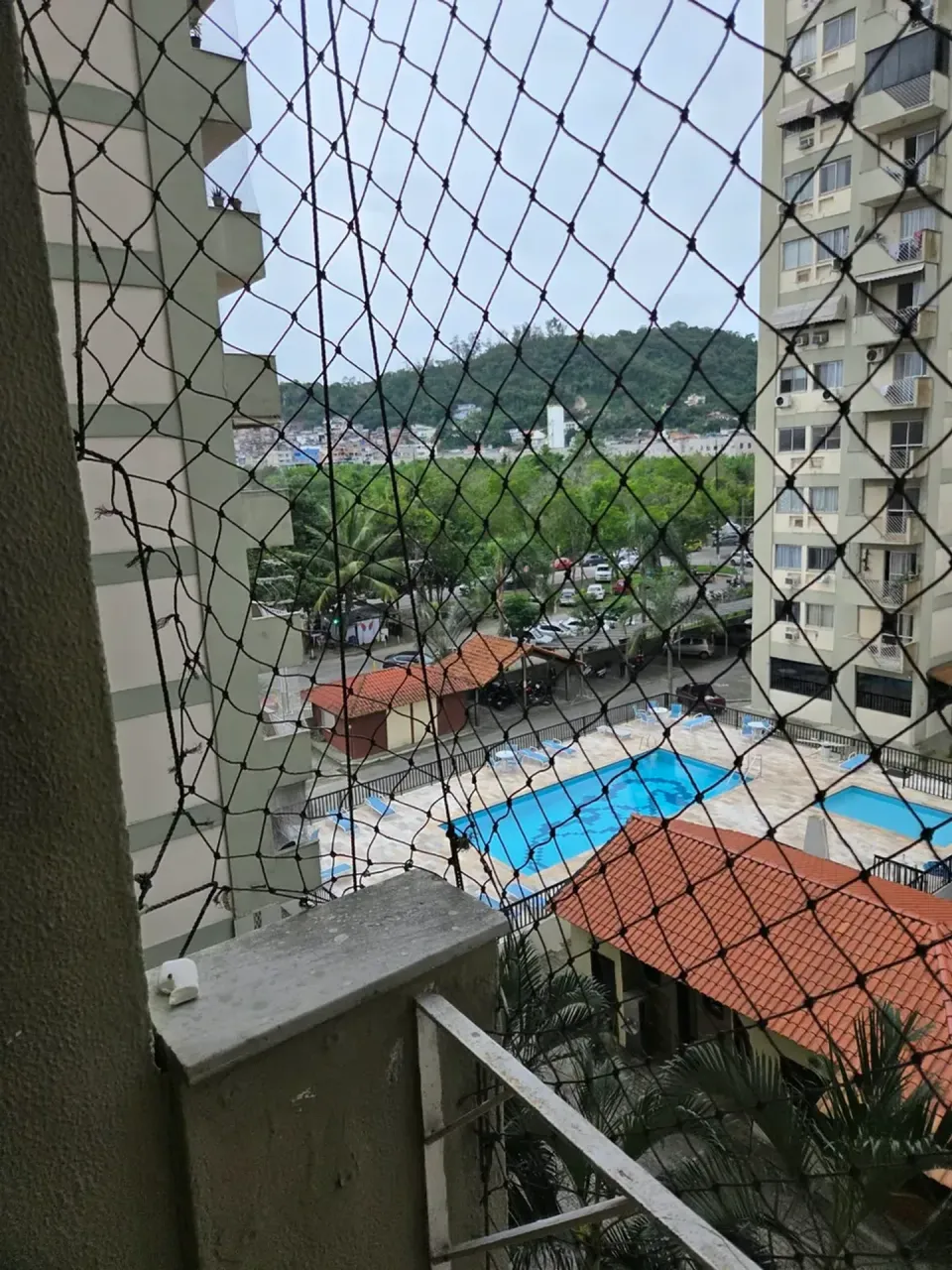 2-bedroom apartment in a building with a pool — photo 15