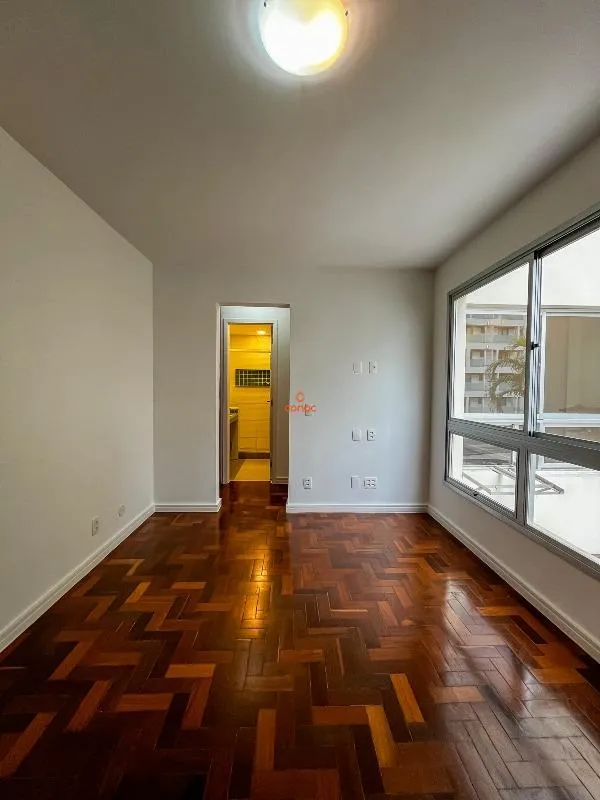 One-bedroom apartment with wood or laminate floors — photo 14