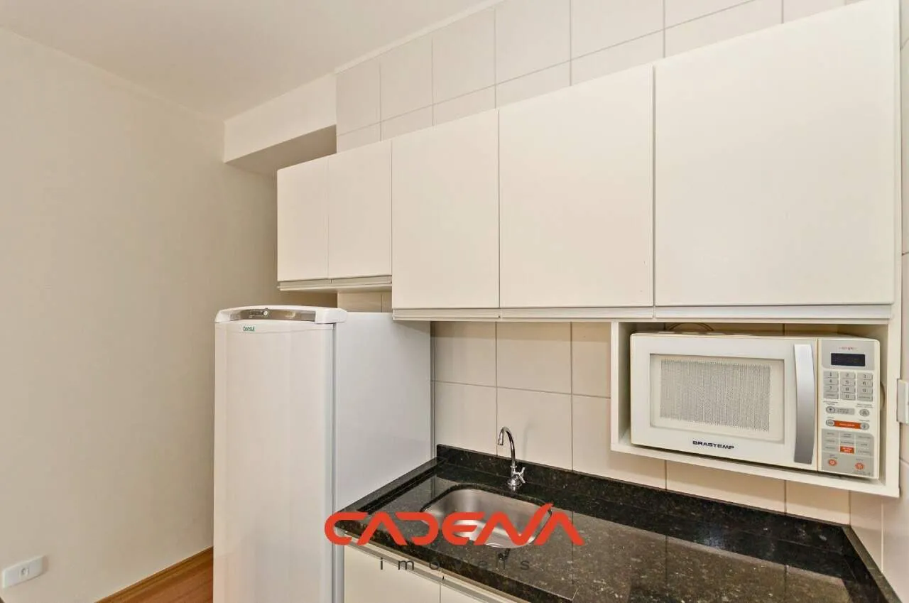 42 m² unfurnished studio with open kitchen and wood floors — photo 5