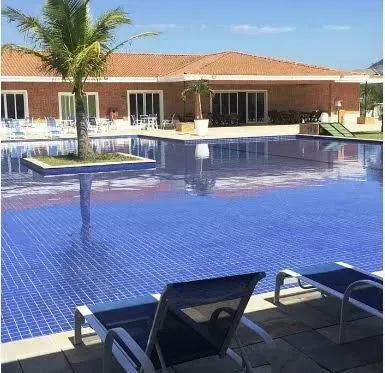 Casa com 4 quartos, 5 banheiros e 3 vagas — photo 38