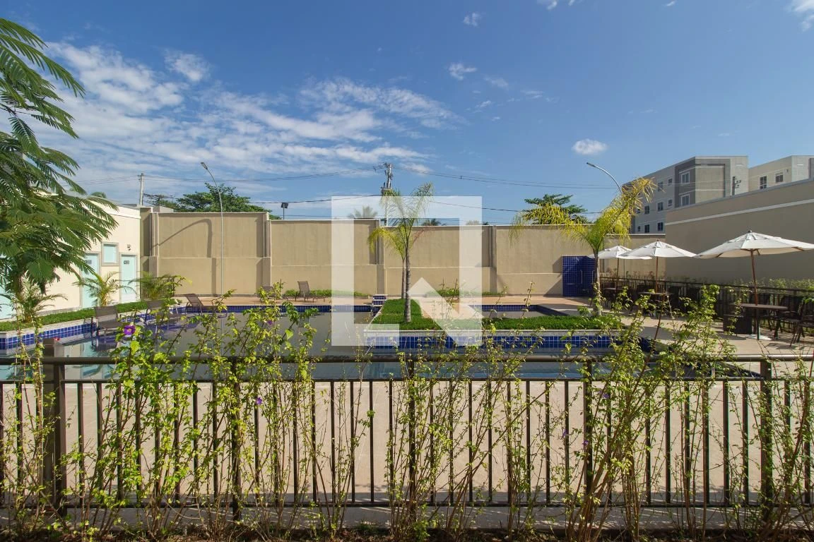 2-bedroom apartment in a building with a pool — photo 28