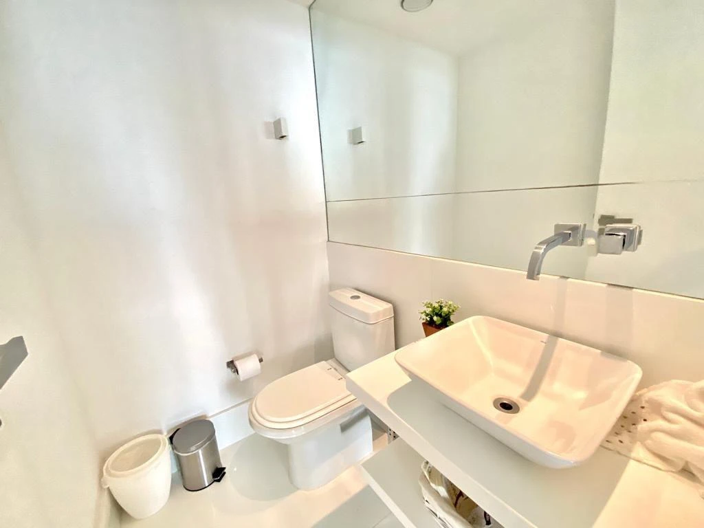 Furnished penthouse with balcony and open-plan kitchen — photo 33