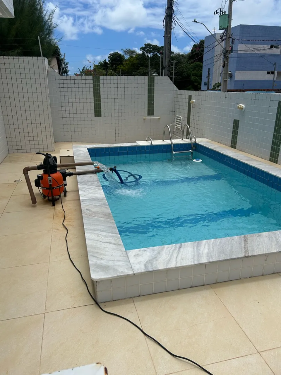 2-bedroom apartment in a building with a pool — photo 7
