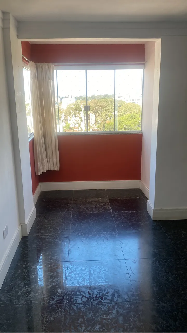 1-bedroom apartment with balcony and laundry area