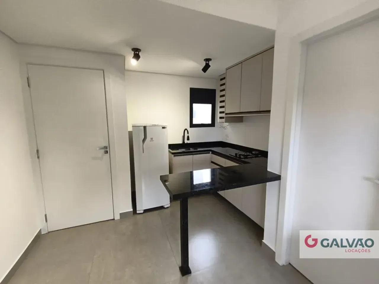 Apartamento de 28,93 m² com cozinha americana e fogão a gás — photo 3
