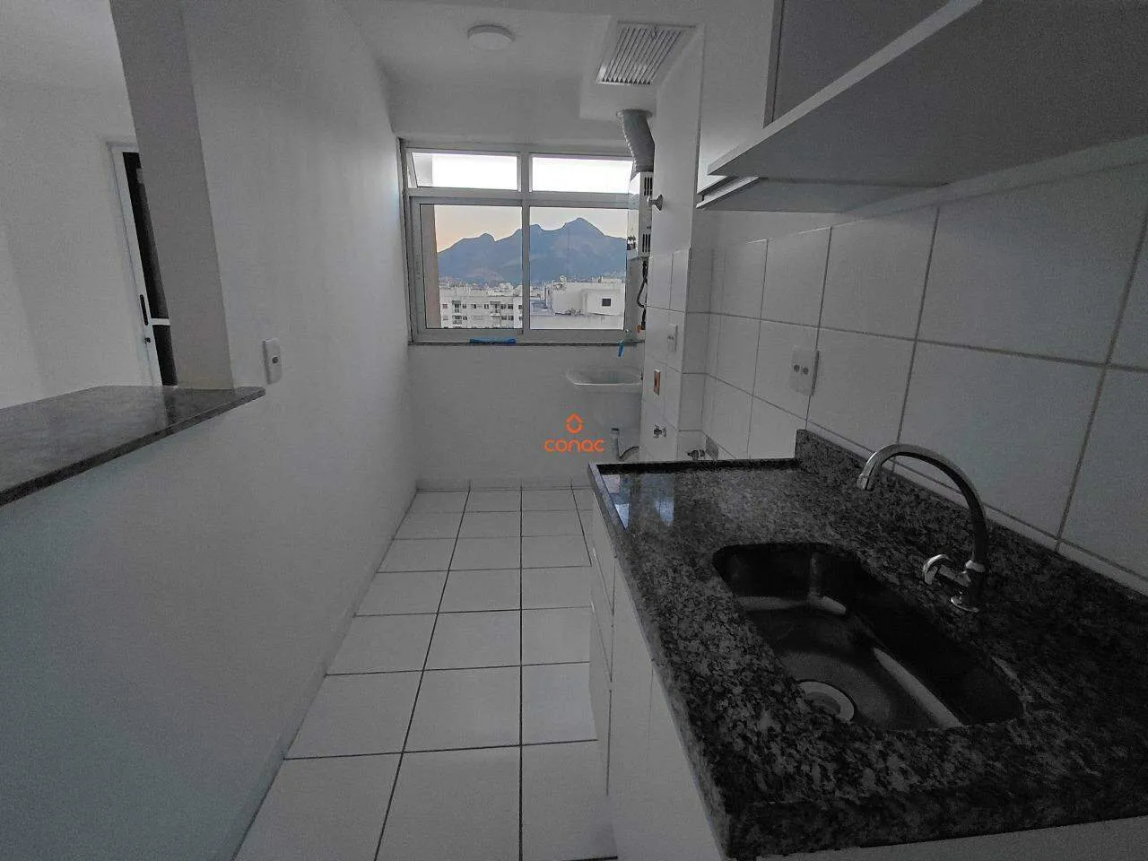 Apartamento com 2 quartos e cozinha integrada