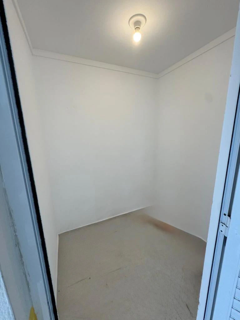 Walk-in closet in a 2-bedroom apartment, 65 m² — photo 18