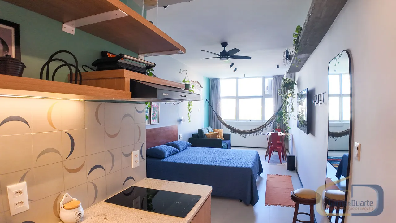 Furnished apartment with open-plan kitchen and glass shower — photo 6