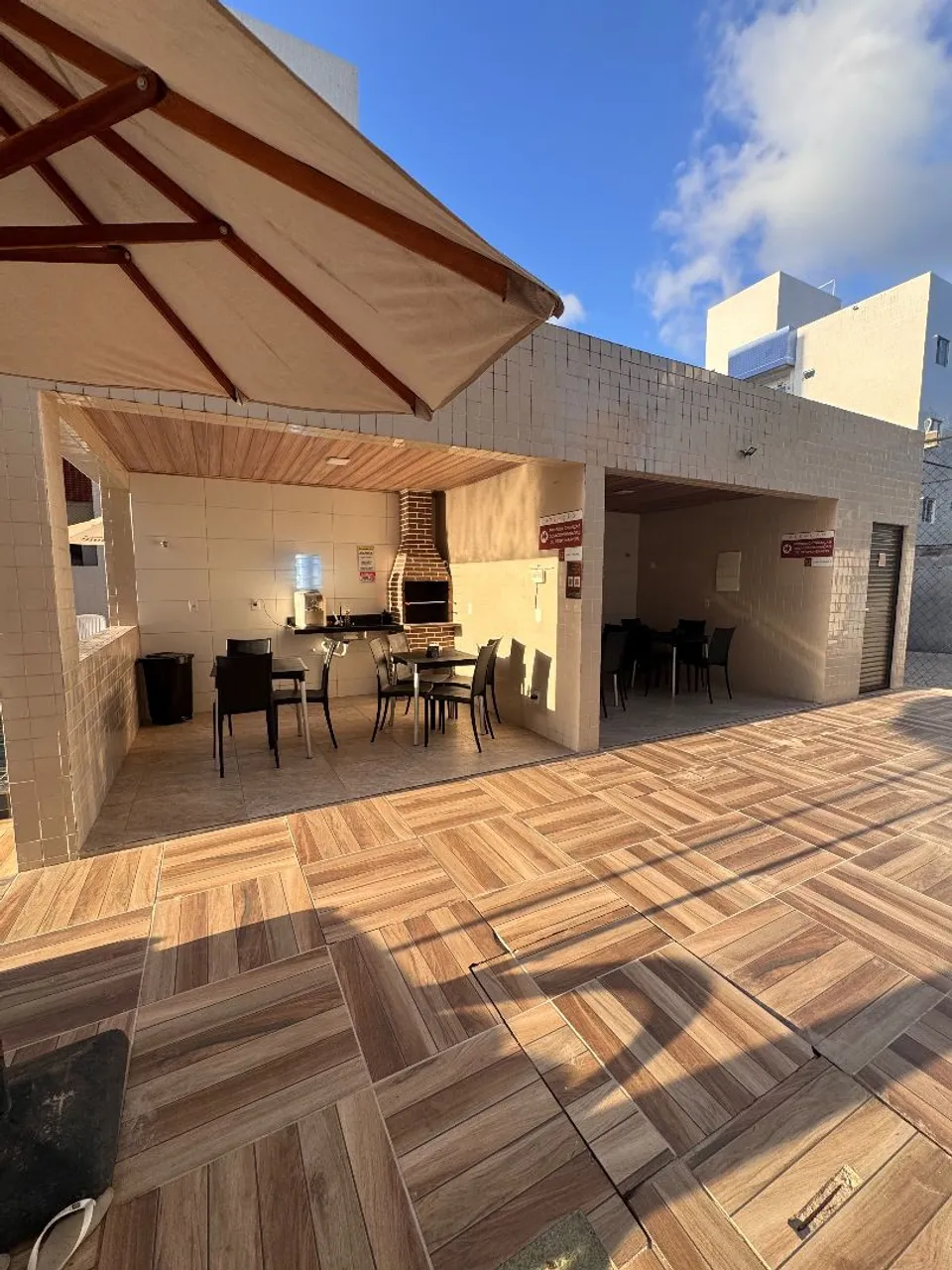 2-bedroom apartment in a building with a pool — photo 16